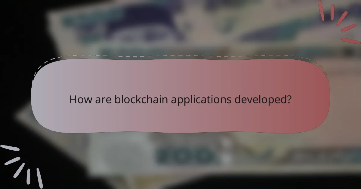 How are blockchain applications developed?